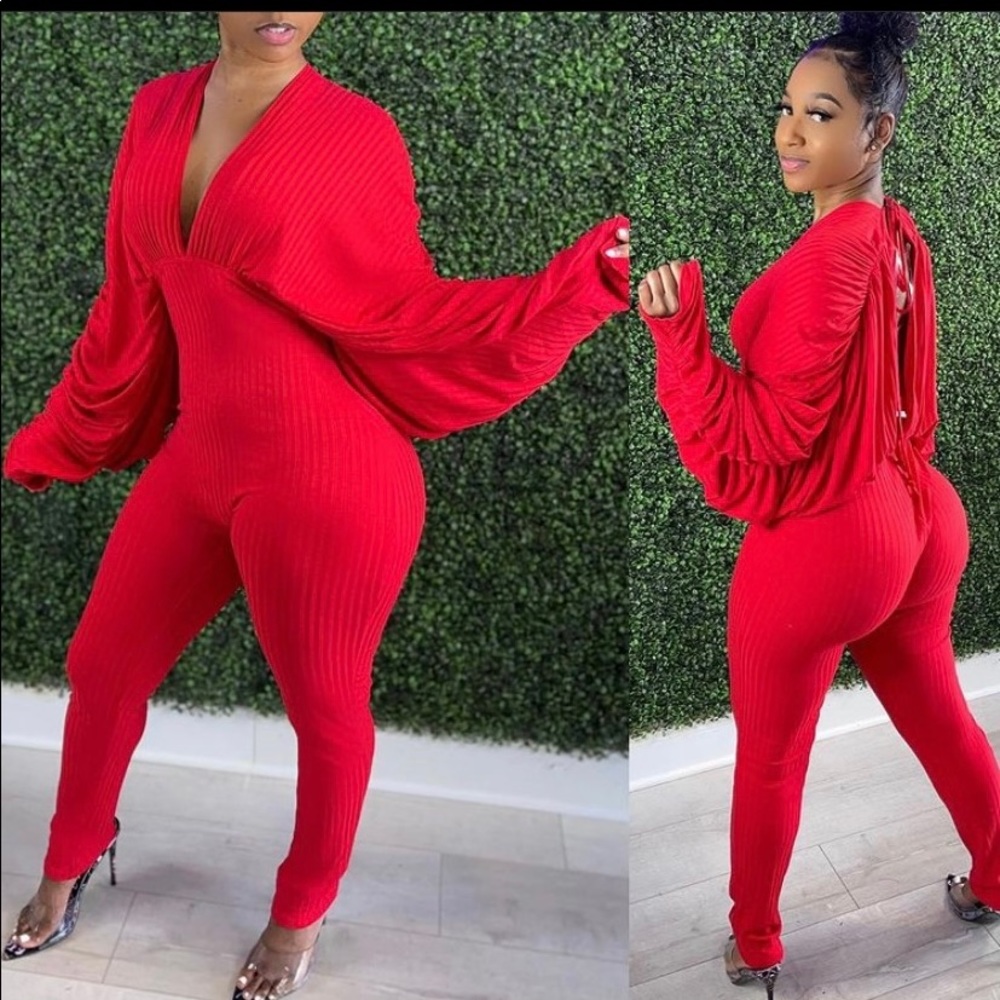 Red jumpsuit with low open back